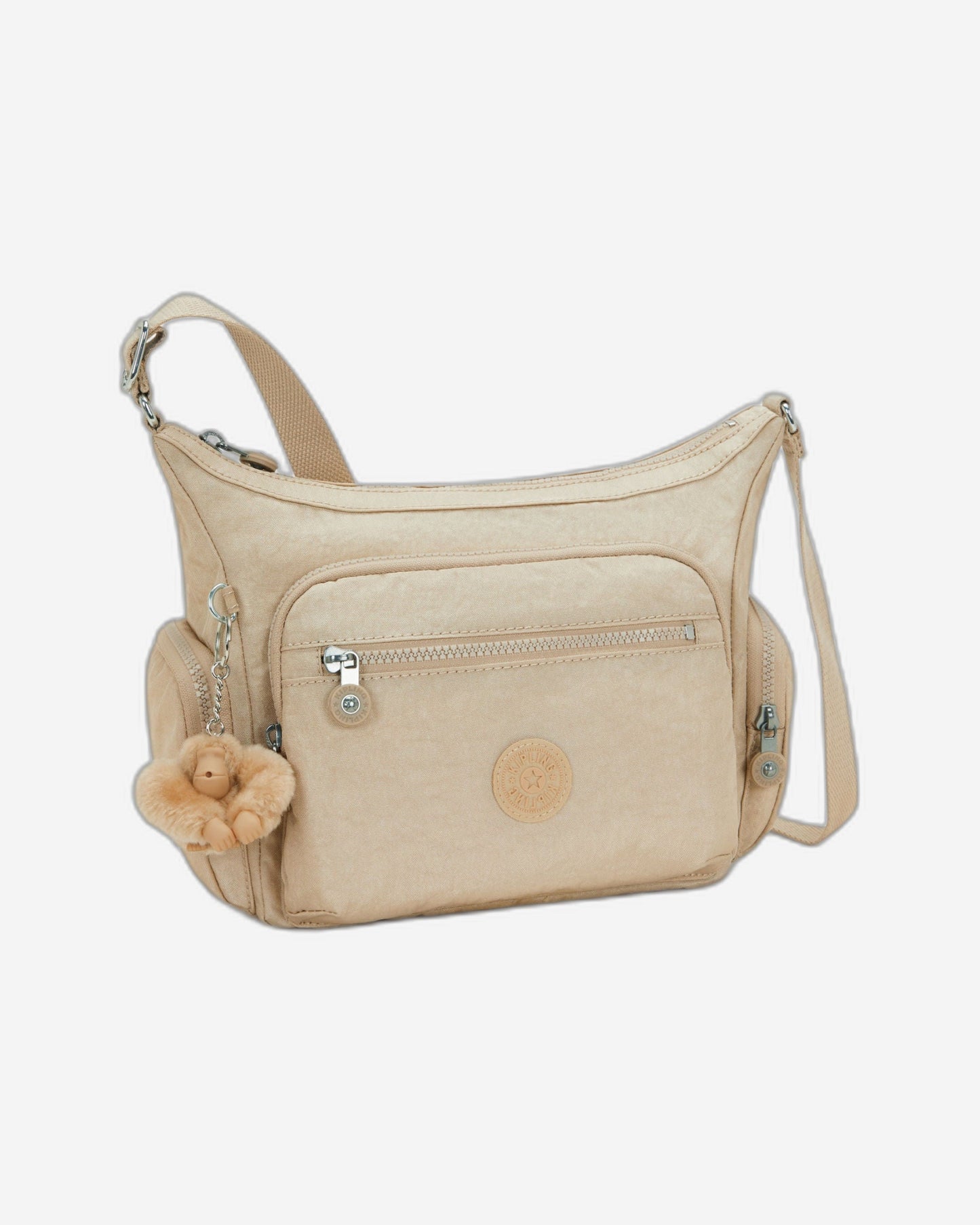 حقيبة كروسبودي متوسطة Kipling Gabbie S لامعة باللون البيج I2532-5DV