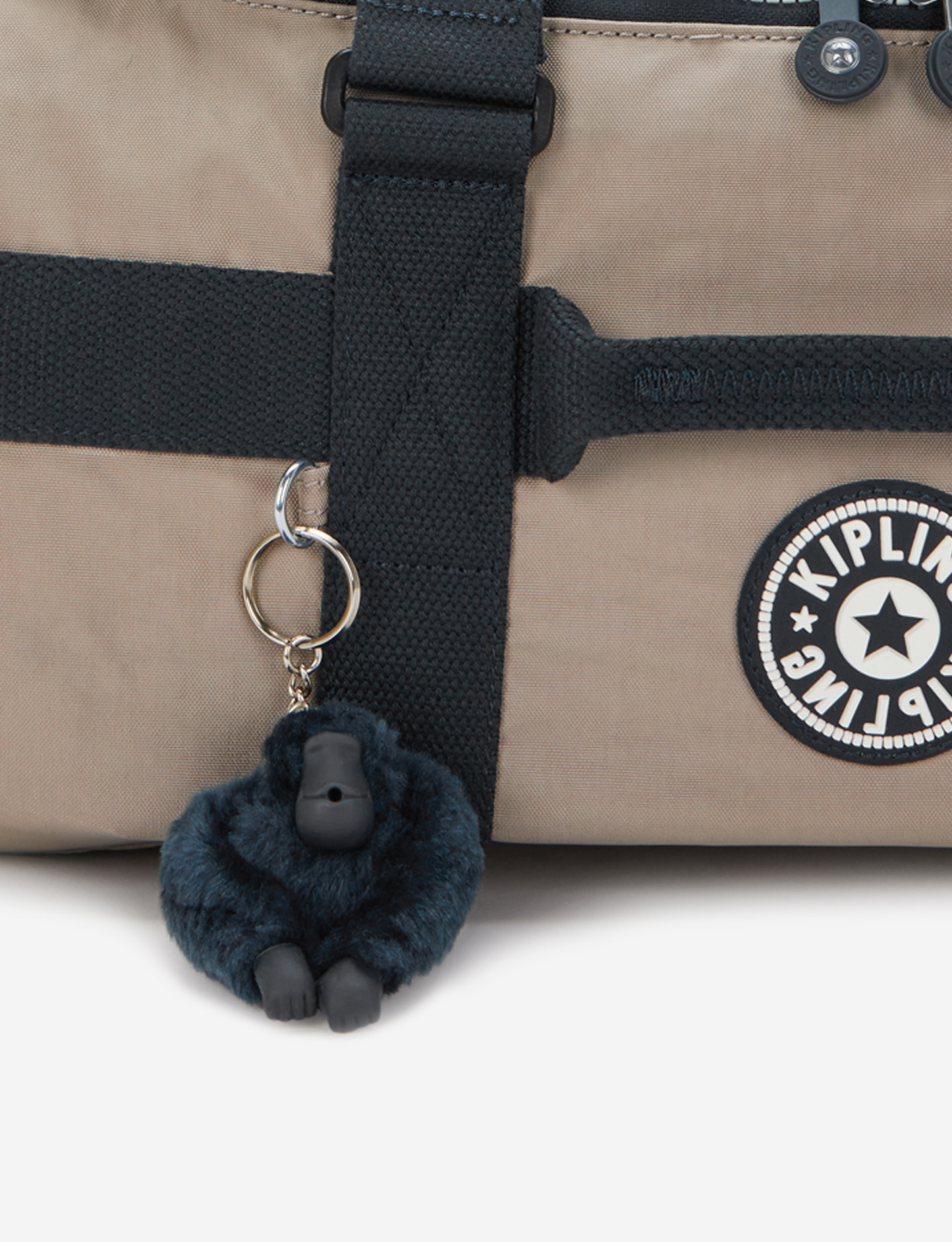 KIPLING Jonis S حقيبة سفر صغيرة (قابلة للتحويل إلى حقيبة ظهر) لون Taupe I7712-7ML