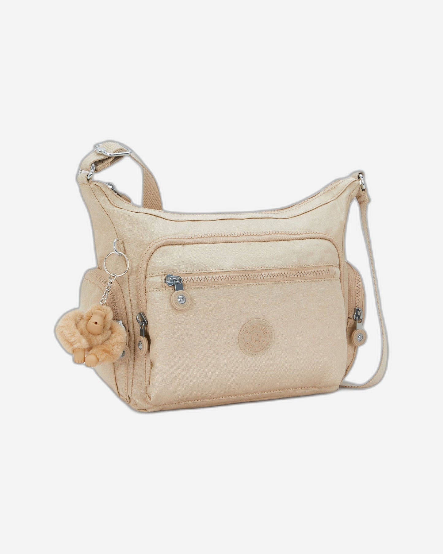 حقيبة كروسبودي متوسطة Kipling Gabbie S لامعة باللون البيج I2532-5DV