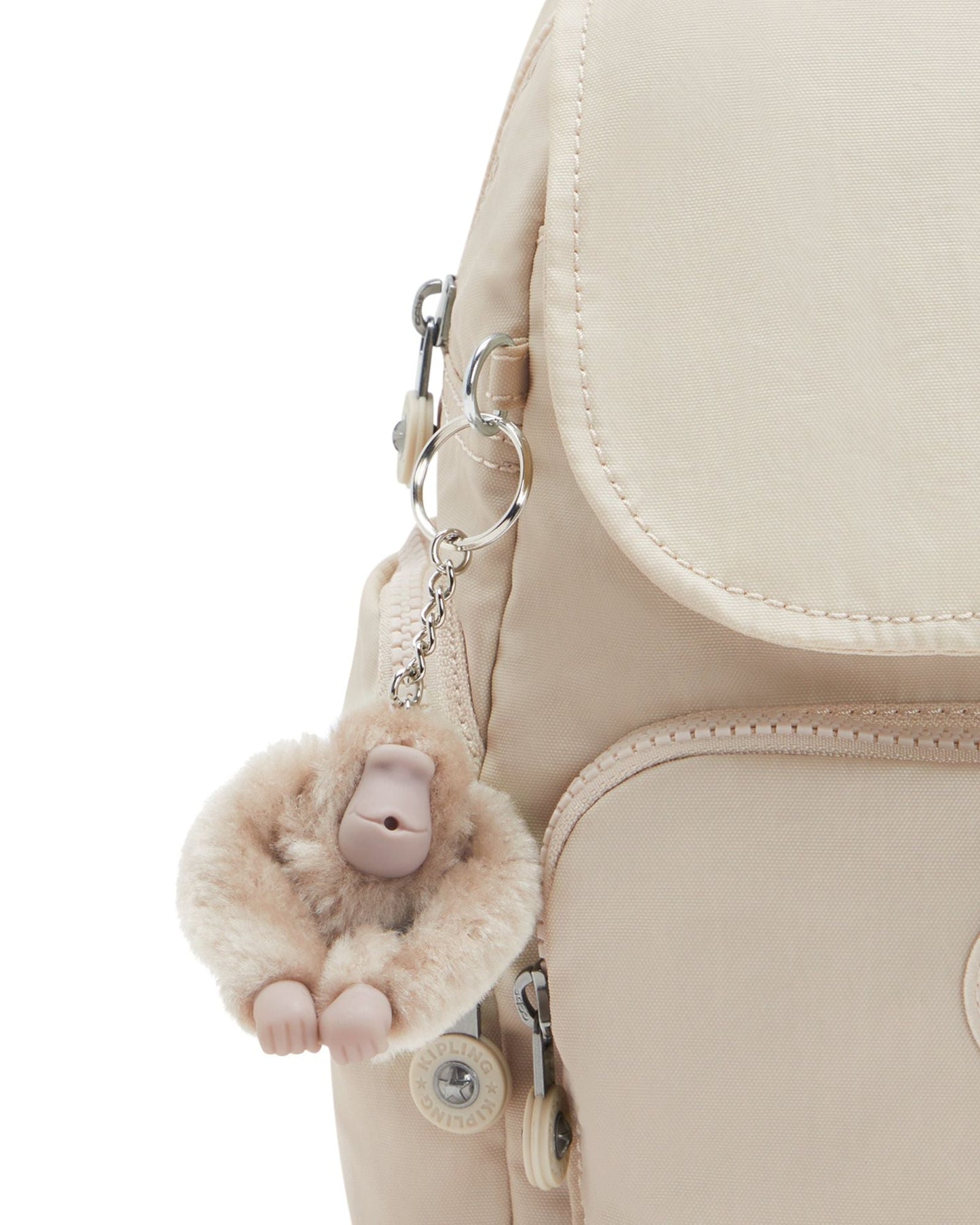 حقيبة ظهر صغيرة Kipling City Zip Mini بلون بيج لؤلؤي C2I4697-3KA